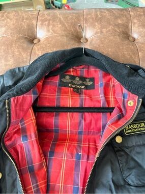 Barbour Black Jacket with Red Tartan Lining